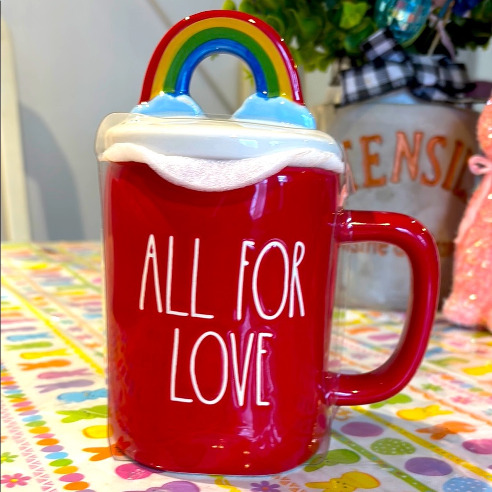 Rae Dunn Red Mug with Rainbow Lid.